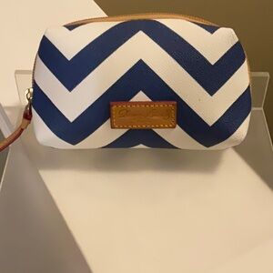 Dooney and Bourke cosmetic bag. 6" x 4"